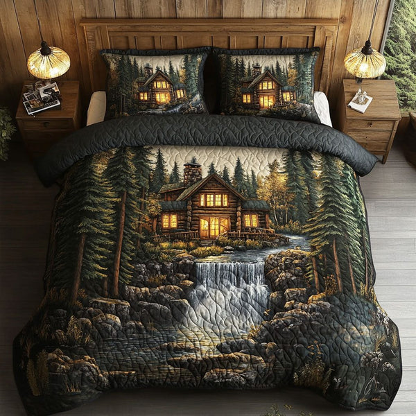 Forest Cabin Waterfall quilted 3-piece bedding set on a made bed with two matching pillow shams