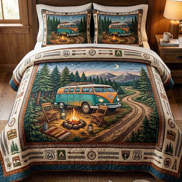 Forest Camp quilted 3-piece bedding set on a made bed with two matching pillow shams