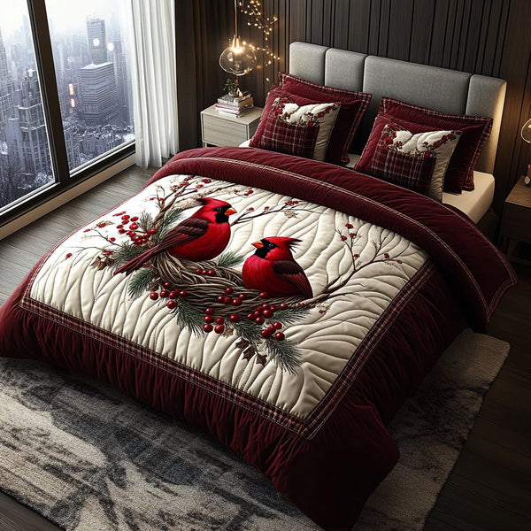 Forest Cardinals quilted 3-piece bedding set on a made bed with two matching pillow shams