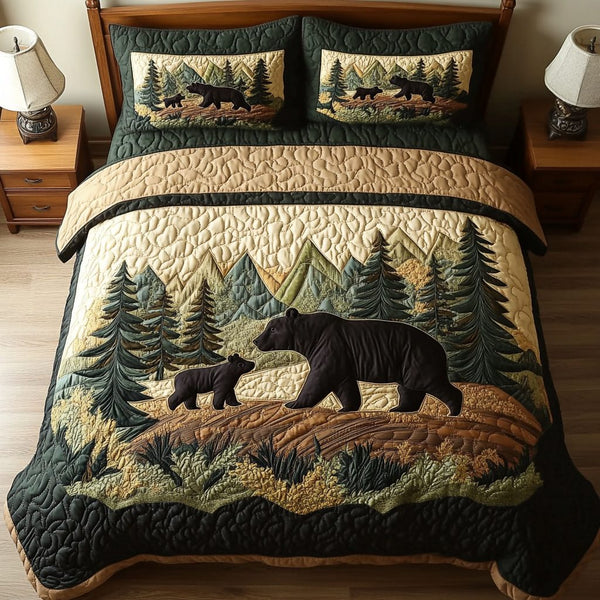 Forest Dreams quilted 3-piece bedding set on a made bed with two matching pillow shams