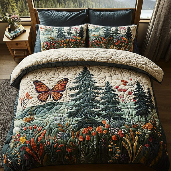 Forest Echo quilted 3-piece bedding set on a made bed with two matching pillow shams