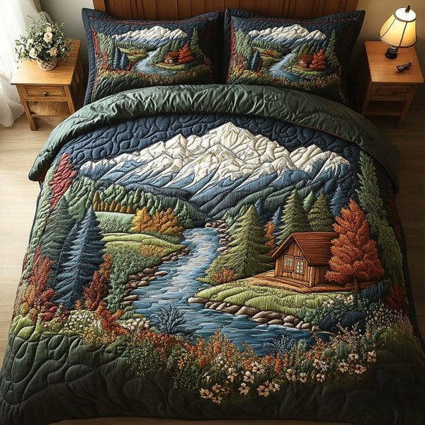 Forest Escape quilted 3-piece bedding set on a made bed with two matching pillow shams