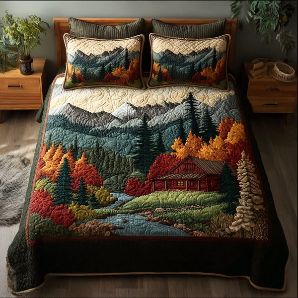 Forest Glow quilted 3-piece bedding set on a made bed with two matching pillow shams