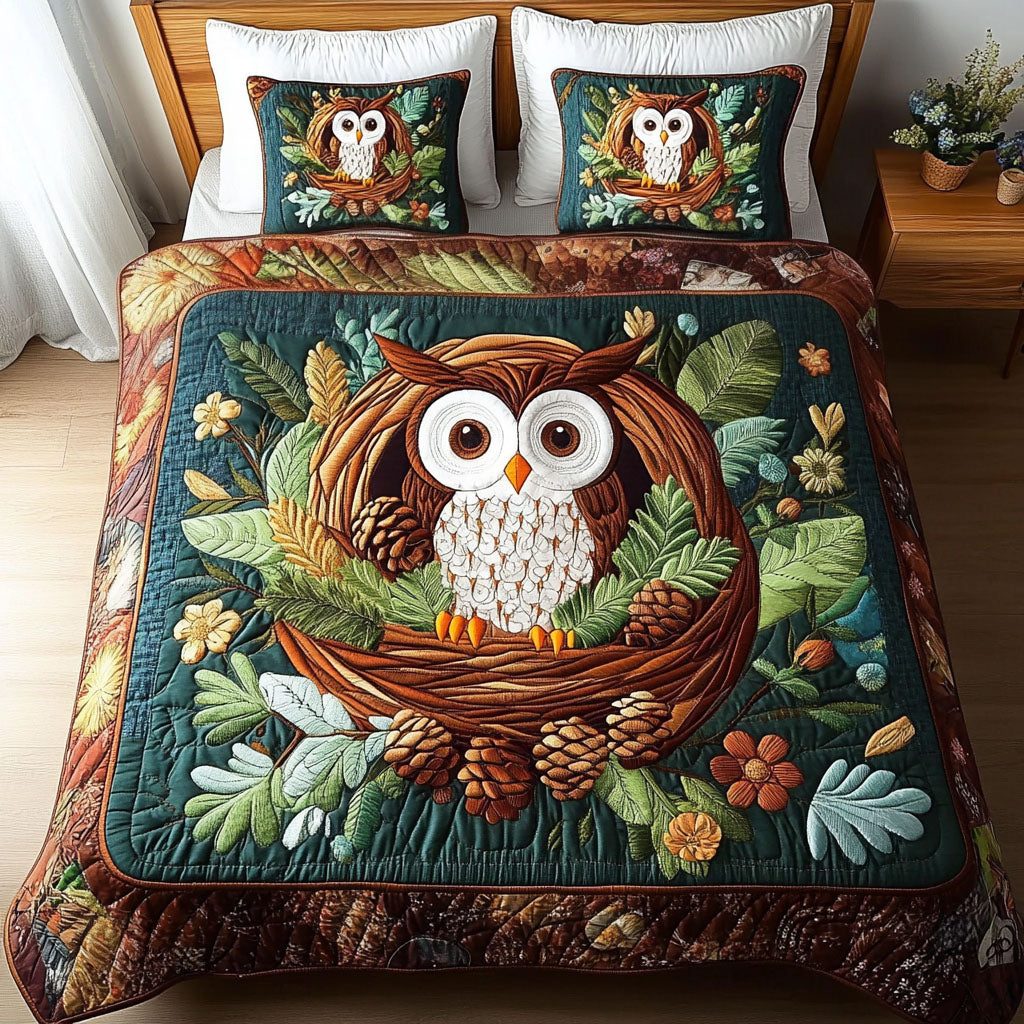 Forest Nest quilted 3-piece bedding set on a made bed with two matching pillow shams