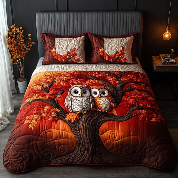Forest Owls quilted 3-piece bedding set on a made bed with two matching pillow shams