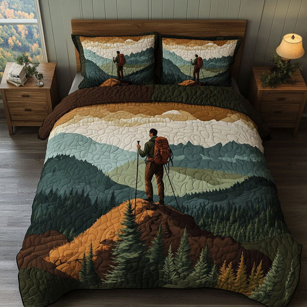 Forest Ridge Hike quilted 3-piece bedding set on a made bed with two matching pillow shams