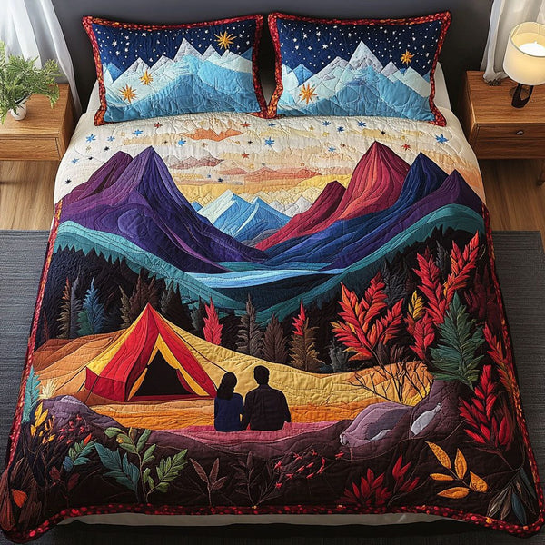 Forest Romance quilted 3-piece bedding set on a made bed with two matching pillow shams