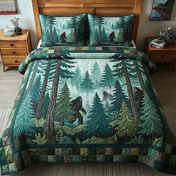 Forest Shadow Bigfoot quilted 3-piece bedding set on a made bed with two matching pillow shams