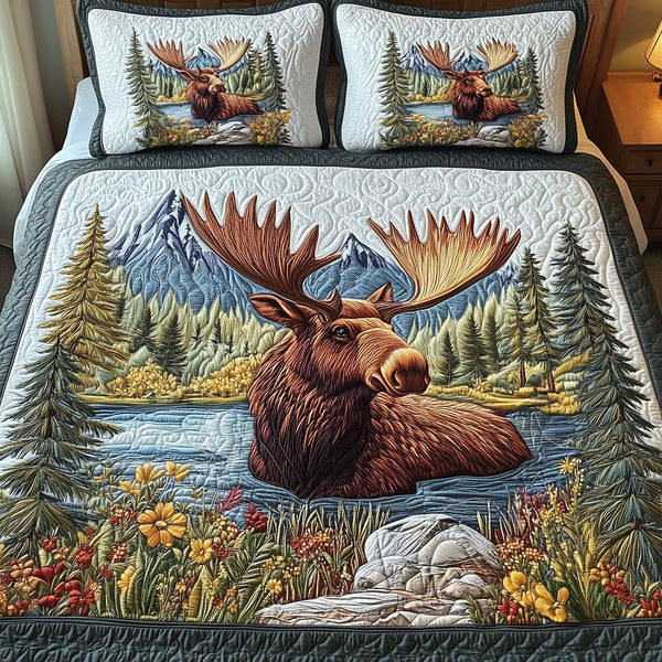 Forest Spirit Moose quilted 3-piece bedding set on a made bed with two matching pillow shams