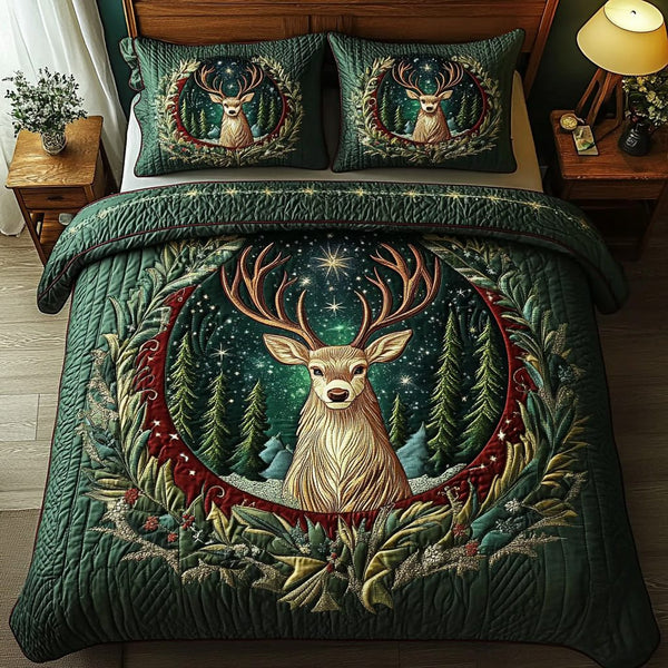 Forest Wanderer quilted 3-piece bedding set on a made bed with two matching pillow shams