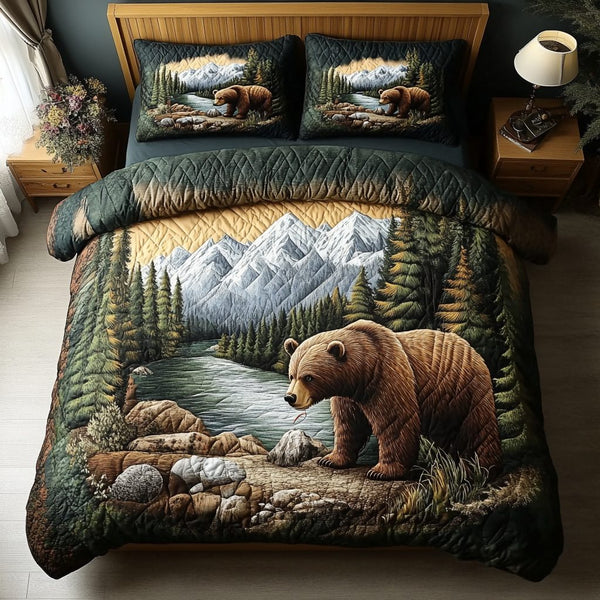 Forest Wanderer quilted 3-piece bedding set on a made bed with two matching pillow shams