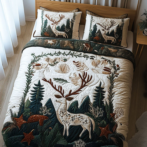 Forest Whispers quilted 3-piece bedding set on a made bed with two matching pillow shams