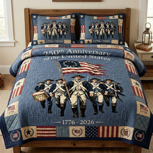 Founding March quilted 3-piece bedding set on a made bed with two matching pillow shams