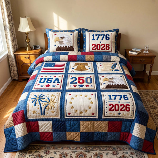 Founding Squares quilted 3-piece bedding set on a made bed with two matching pillow shams