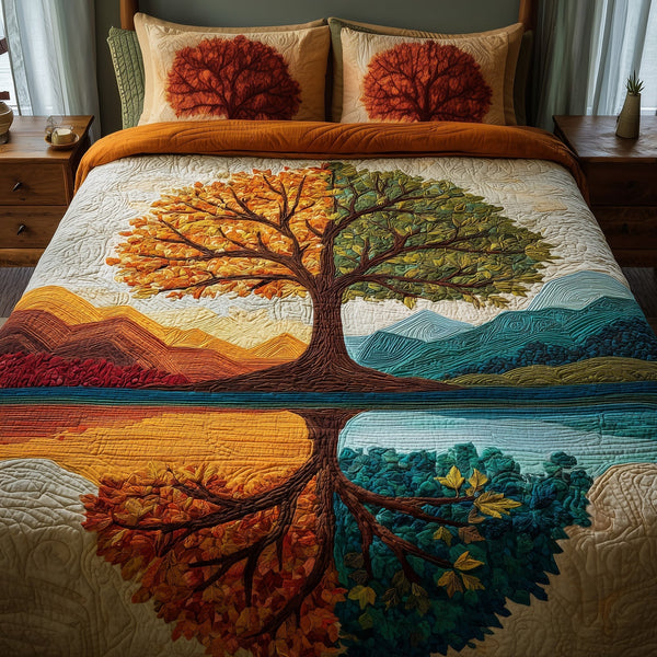 Four Seasons Tree quilted 3-piece bedding set on a made bed with two matching pillow shams