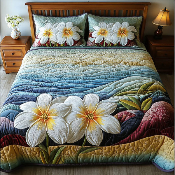 Fragrant Paradise quilted 3-piece bedding set on a made bed with two matching pillow shams