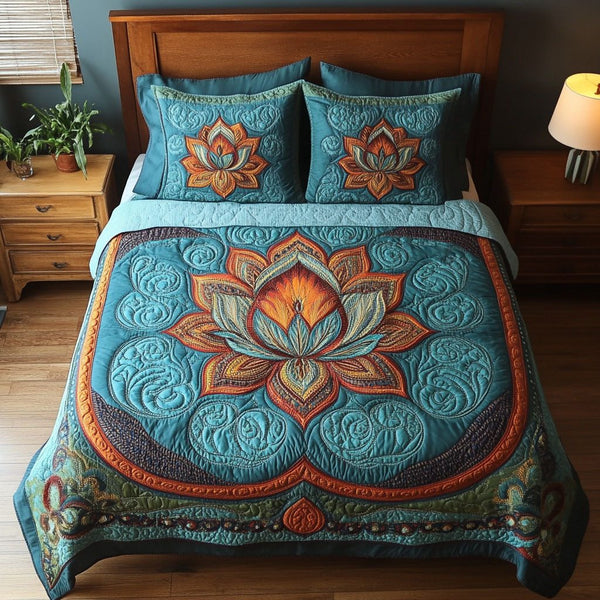 Free Soul quilted 3-piece bedding set on a made bed with two matching pillow shams