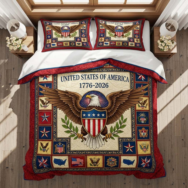 Freedom Emblem quilted 3-piece bedding set on a made bed in a warmly lit bedroom