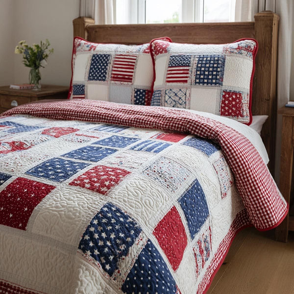 Freedom Fields quilted 3-piece bedding set on a made bed in a warmly lit bedroom
