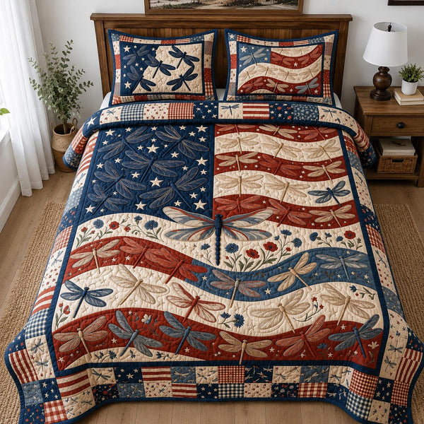 Freedom Flight quilted 3-piece bedding set on a made bed in a warmly lit bedroom