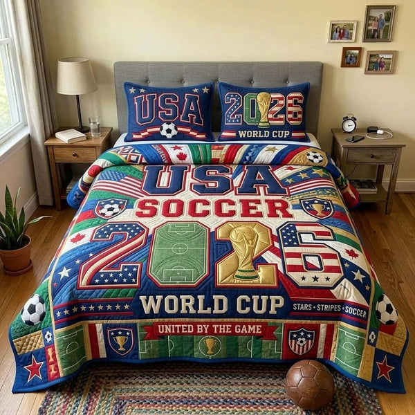 Freedom Goal quilted 3-piece bedding set on a made bed in a warmly lit bedroom