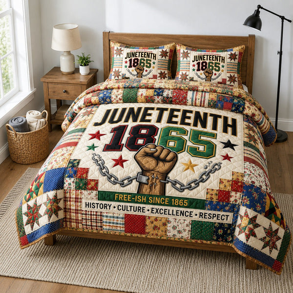Freedom Heritage quilted 3-piece bedding set on a made bed in a warmly lit bedroom