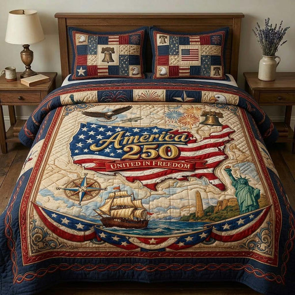 Freedom Map quilted 3-piece bedding set on a made bed in a warmly lit bedroom