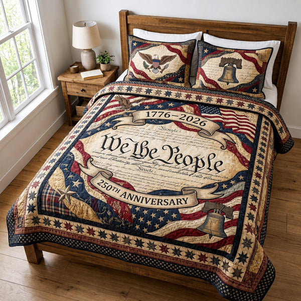 Freedom Patch quilted 3-piece bedding set on a made bed in a warmly lit bedroom