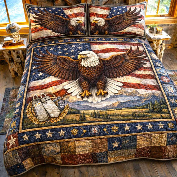 Freedom Pride quilted 3-piece bedding set on a made bed in a warmly lit bedroom
