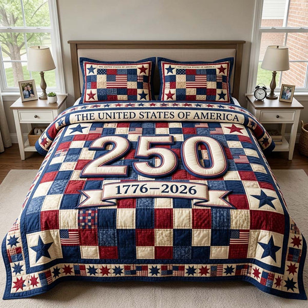 Freedom Quilt quilted 3-piece bedding set on a made bed in a warmly lit bedroom