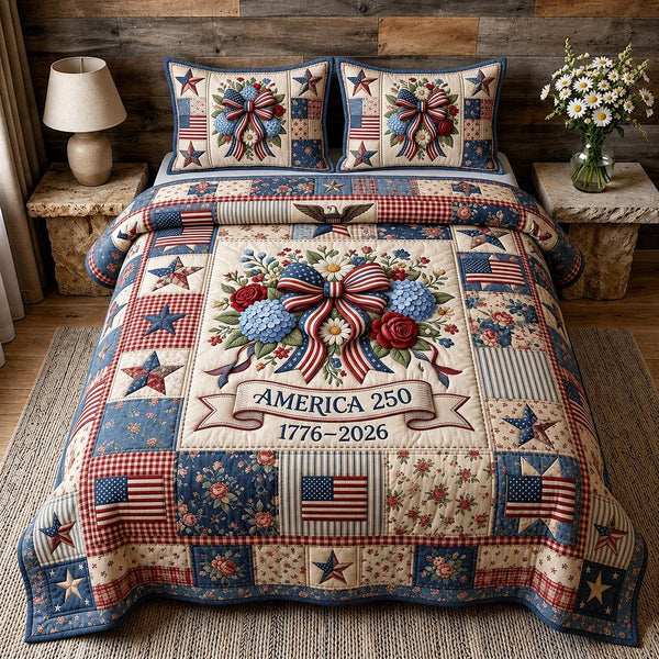 Freedom Stars quilted 3-piece bedding set on a made bed in a warmly lit bedroom