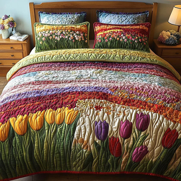 Fresh Bloom quilted 3-piece bedding set on a made bed with two matching pillow shams