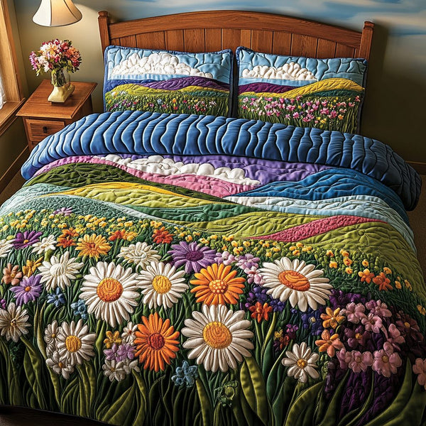 Fresh Blooms quilted 3-piece bedding set on a made bed with two matching pillow shams