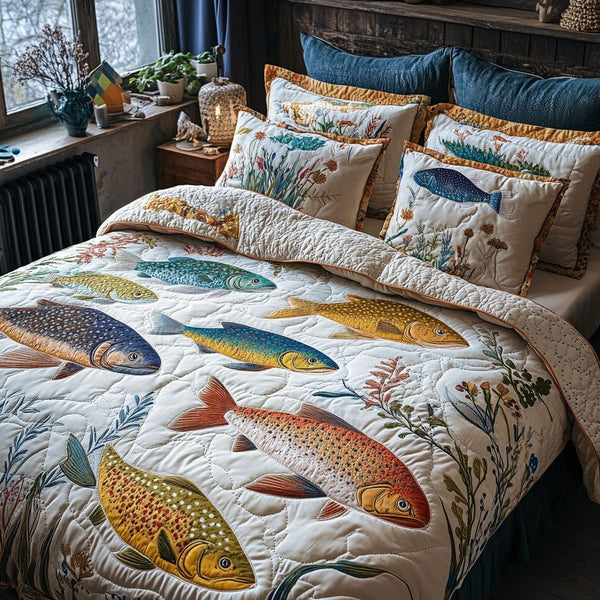 Freshwater Dreams quilted 3-piece bedding set on a made bed with two matching pillow shams