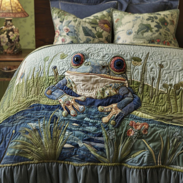 Frog Symphony quilted 3-piece bedding set on a made bed with two matching pillow shams