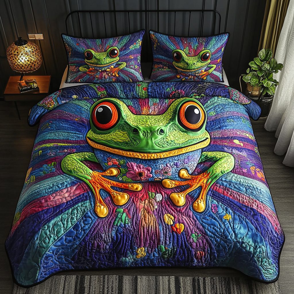 Frog Whisperer quilted 3-piece bedding set on a made bed with two matching pillow shams