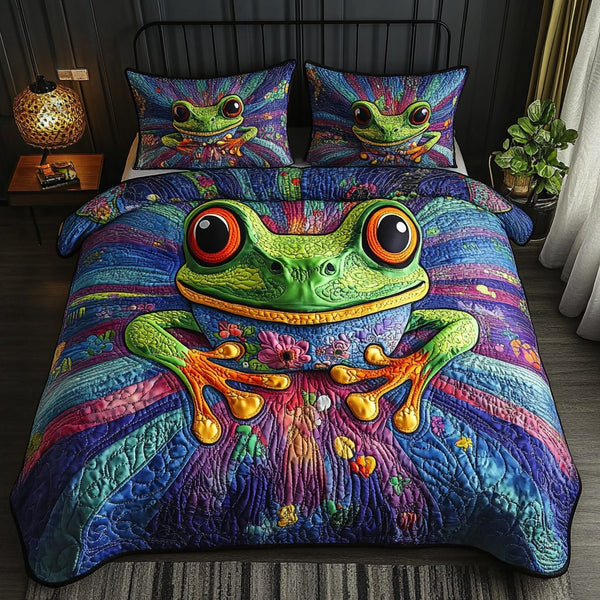 Frog Whisperer quilted 3-piece bedding set on a made bed with two matching pillow shams