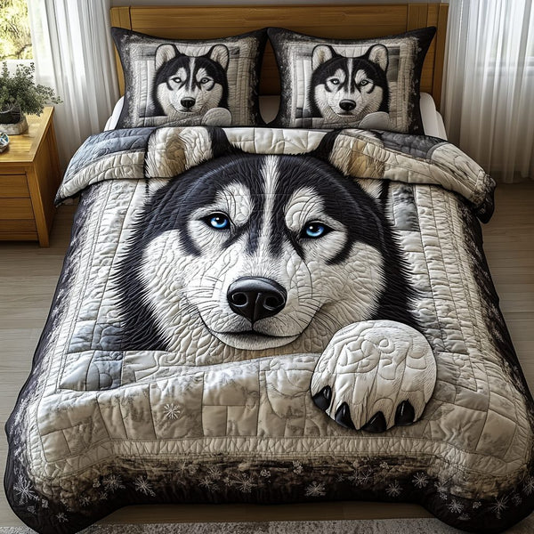 Frostbite Chase quilted 3-piece bedding set on a made bed in a winter-styled bedroom