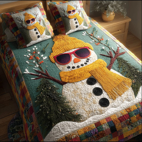 Frosty Glow quilted 3-piece bedding set on a made bed in a winter-styled bedroom