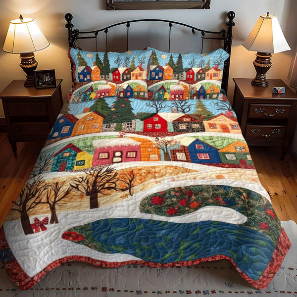 Frosty Morning Comfort quilted 3-piece bedding set on a made bed in a winter-styled bedroom