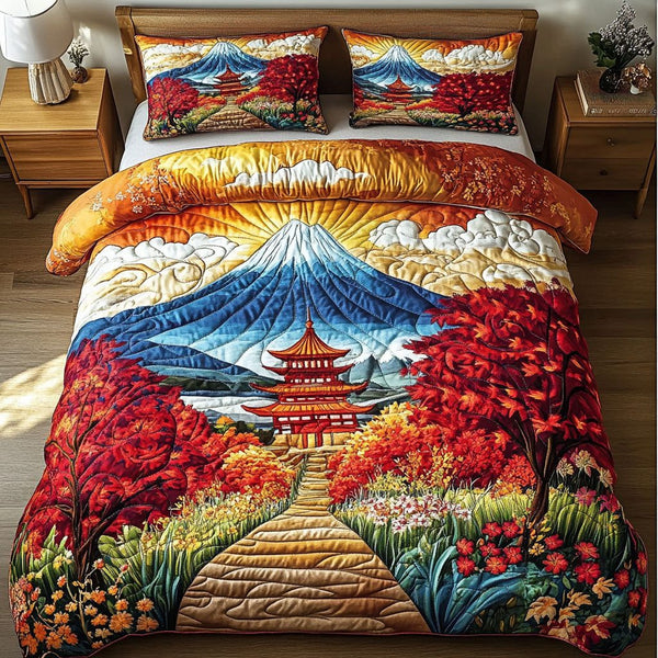 Fuji Autumn Mist quilted 3-piece bedding set on a made bed with two matching pillow shams