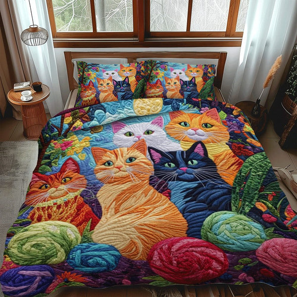 Funky Yarn Cat quilted 3-piece bedding set on a made bed with two matching pillow shams