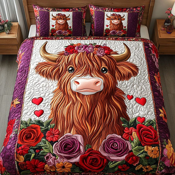 Furry Romance quilted 3-piece bedding set on a made bed with two matching pillow shams