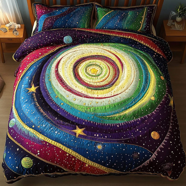 Galactic Wonder quilted 3-piece bedding set on a made bed with two matching pillow shams