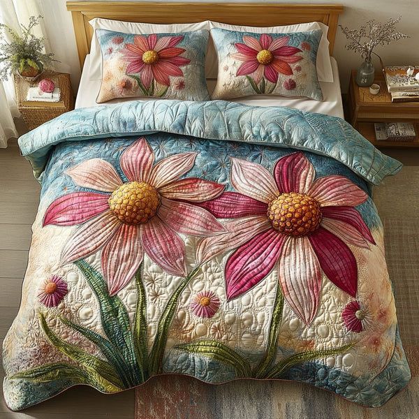 Garden Bliss quilted 3-piece bedding set on a made bed with two matching pillow shams