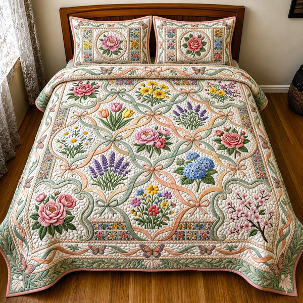 Garden Bloom quilted 3-piece bedding set on a made bed with two matching pillow shams