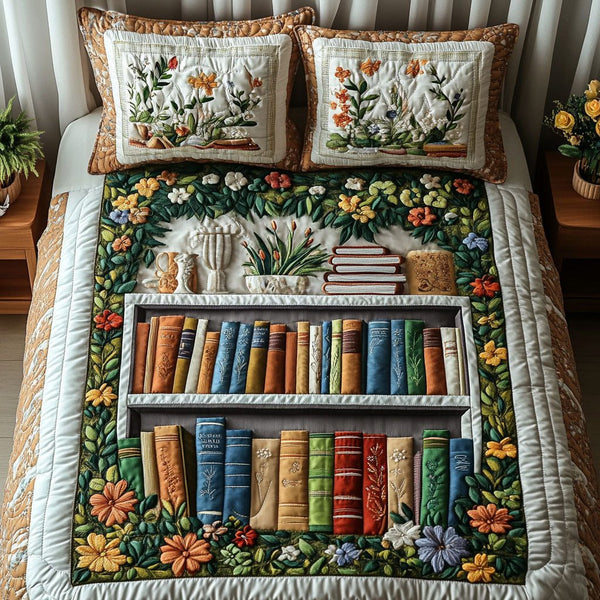 Garden Bookshelf Glow quilted 3-piece bedding set on a made bed with two matching pillow shams