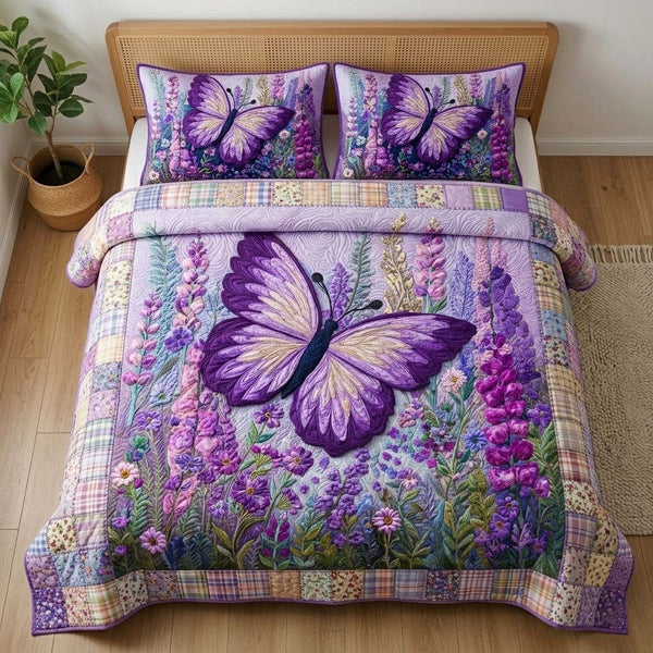 Garden Butterfly quilted 3-piece bedding set on a made bed with two matching pillow shams