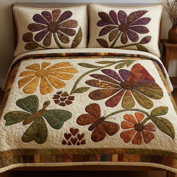 Garden Charm quilted 3-piece bedding set on a made bed with two matching pillow shams