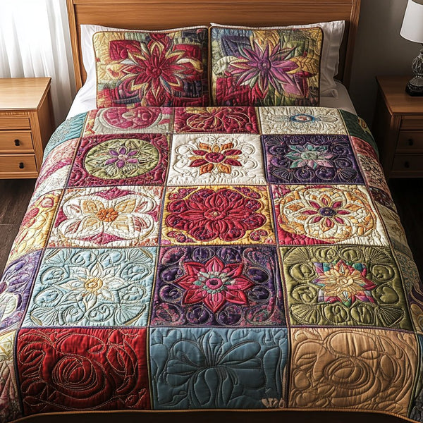 Garden Charm quilted 3-piece bedding set on a made bed with two matching pillow shams